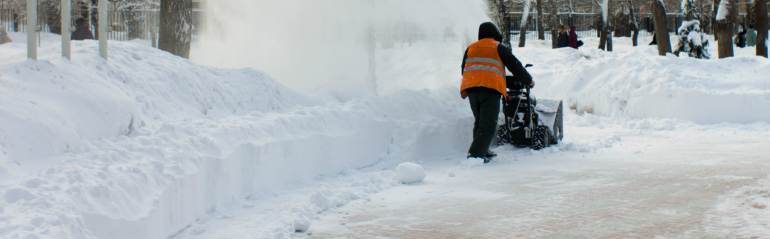 man doing snow removal